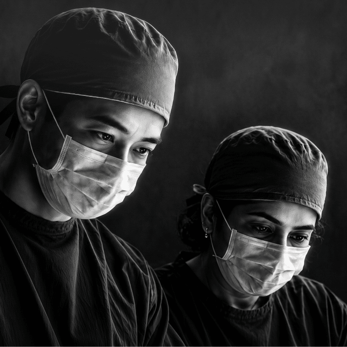 Two clinicians caring for patients