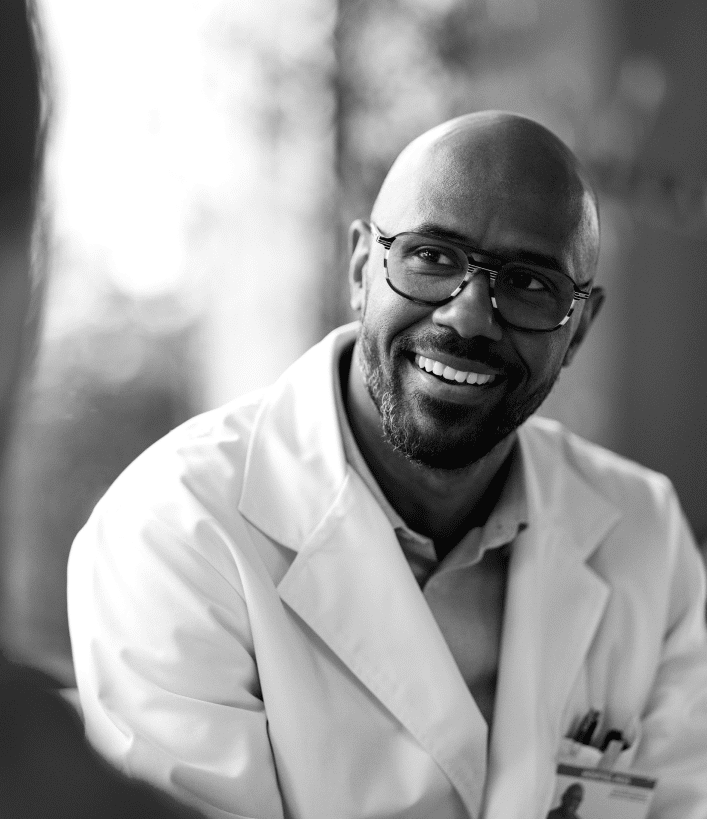A smiling physician